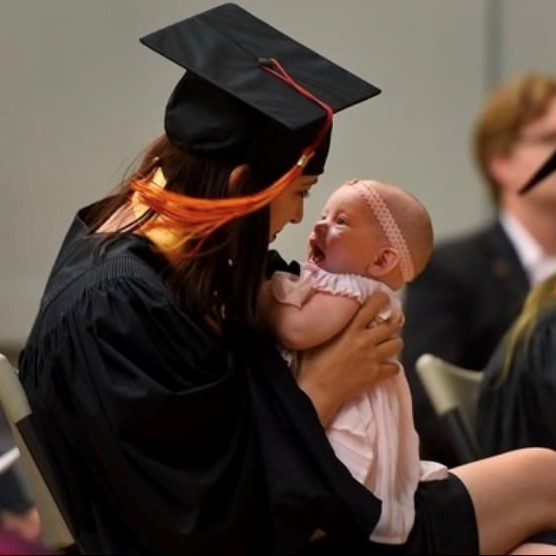 IMG_3559 copy a graduate mother with kid