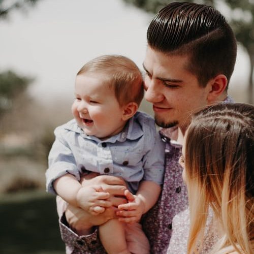 photo-1523663918461-ba90a11877a6 parents and kid