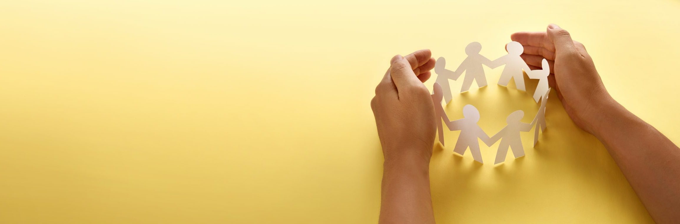 hand with group holding hands
