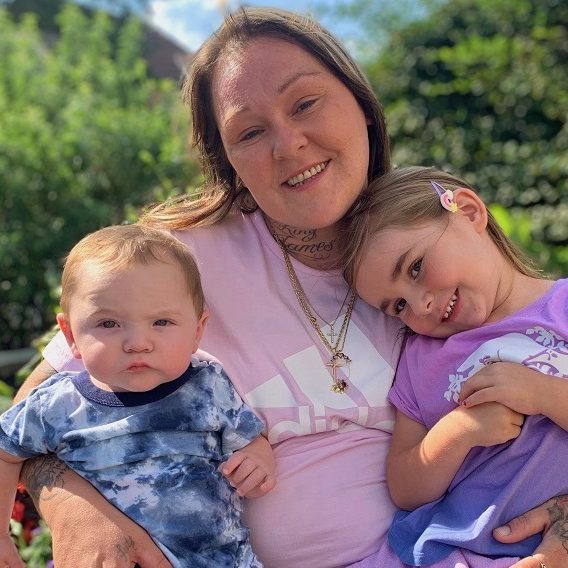 Barbies-story-web a mother holding two kids